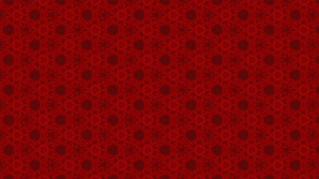 A close-up of a red patterned fabric or material swatch with a repeating dark red ornamental motif.