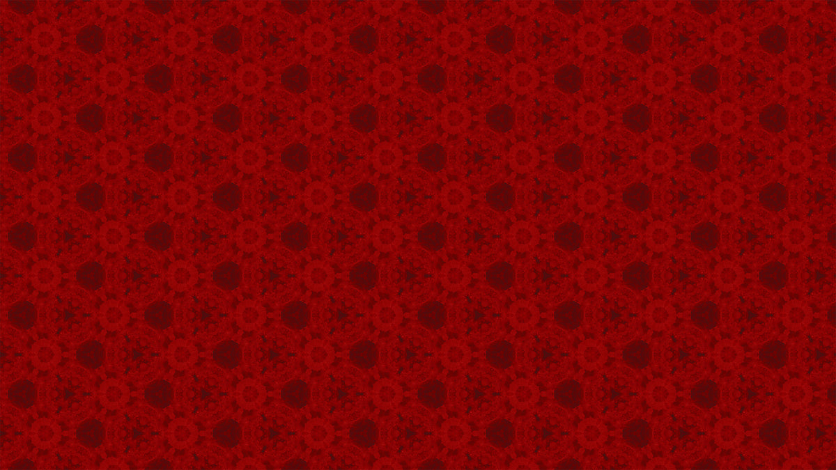 A close-up of a red patterned fabric or material swatch with a repeating dark red ornamental motif.
