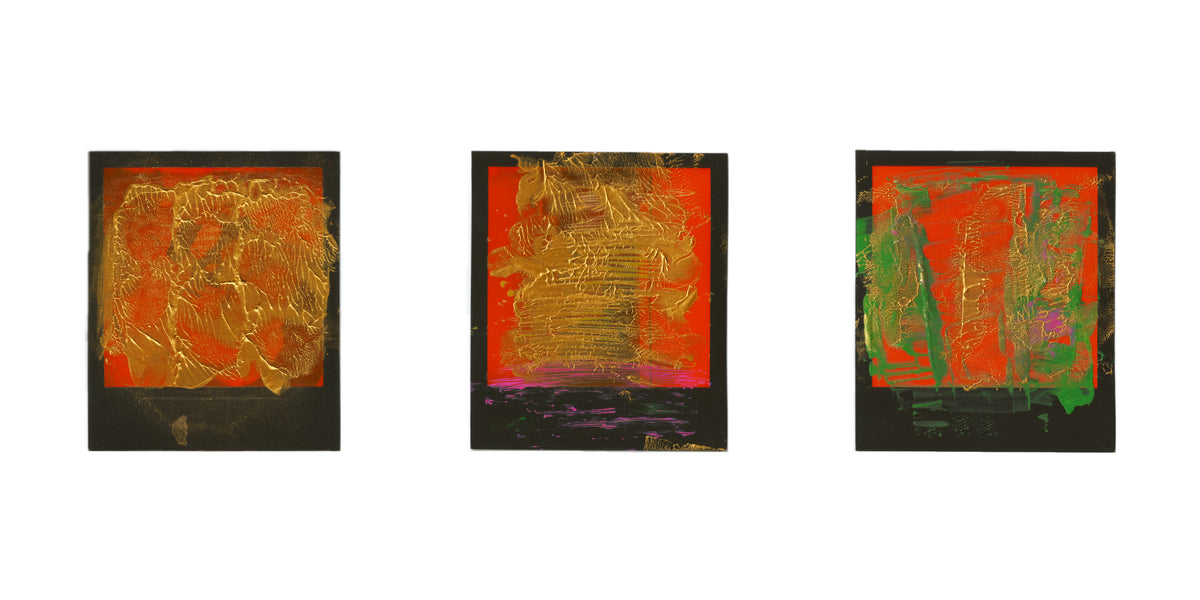 Three polaroids with black borders, featuring textured red, orange, gold, green, and purple brushstrokes, displayed side-by-side on a white background.