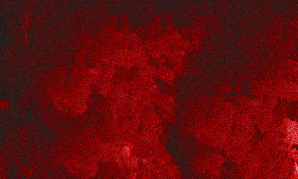 A close-up of a textured red surface with mottled dark red and black areas, resembling a painted or embossed material swatch.