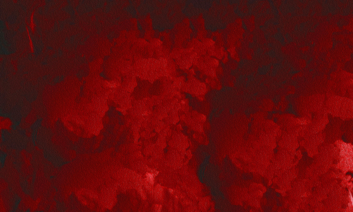 A close-up of a textured red surface with mottled dark red and black areas, resembling a painted or embossed material swatch.
