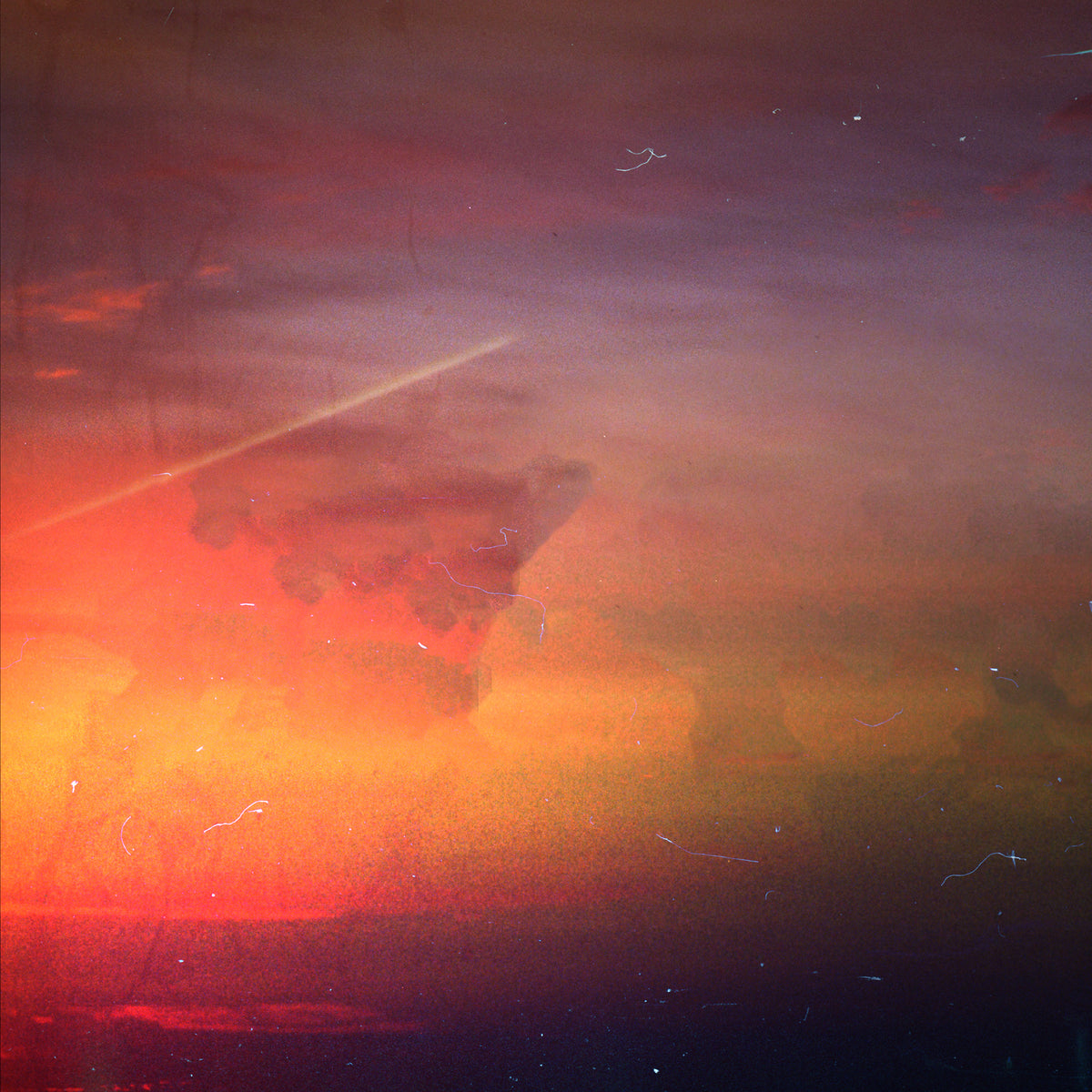 An abstract landscape photograph or painting depicting a dramatic sunset sky with vibrant orange, red, and purple hues, featuring a shooting star and a soft haze.
